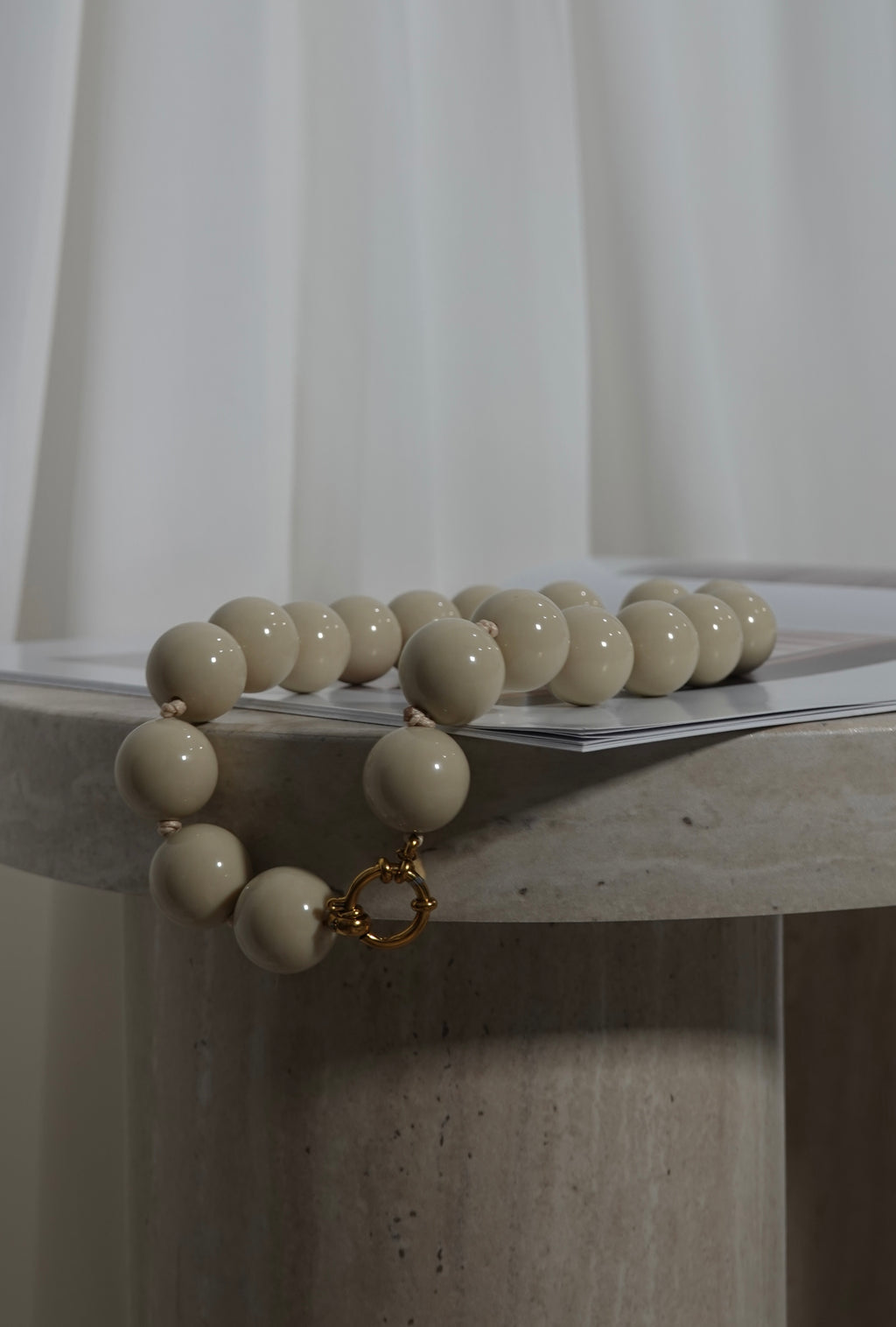 COLLAR BOLAS XL BEIGE